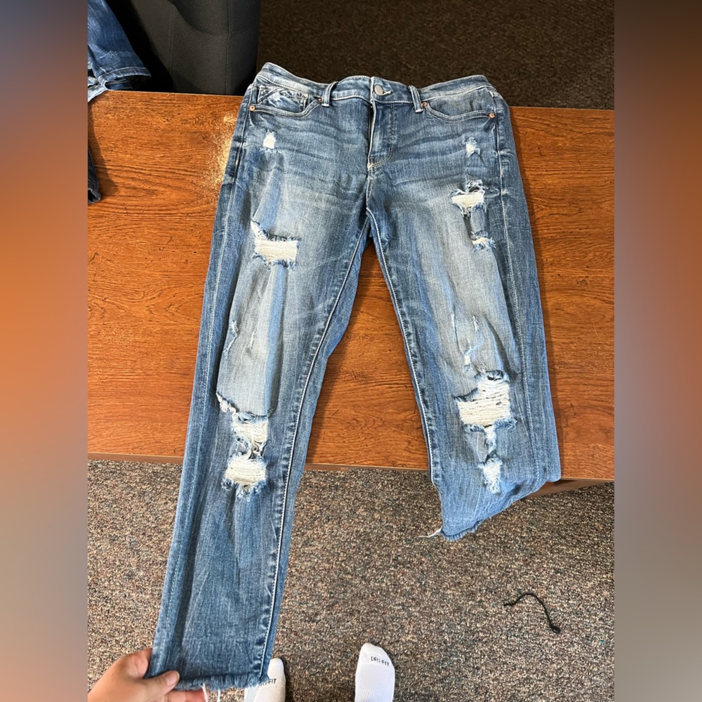 Buckle skinny jeans